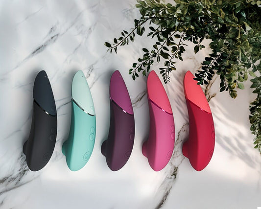 Womanizer Next zwart met bijgeleverde accessoires
