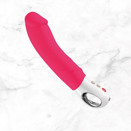 Big Boss Fun Factory in roze met wit handvat op marmeren achtergrond