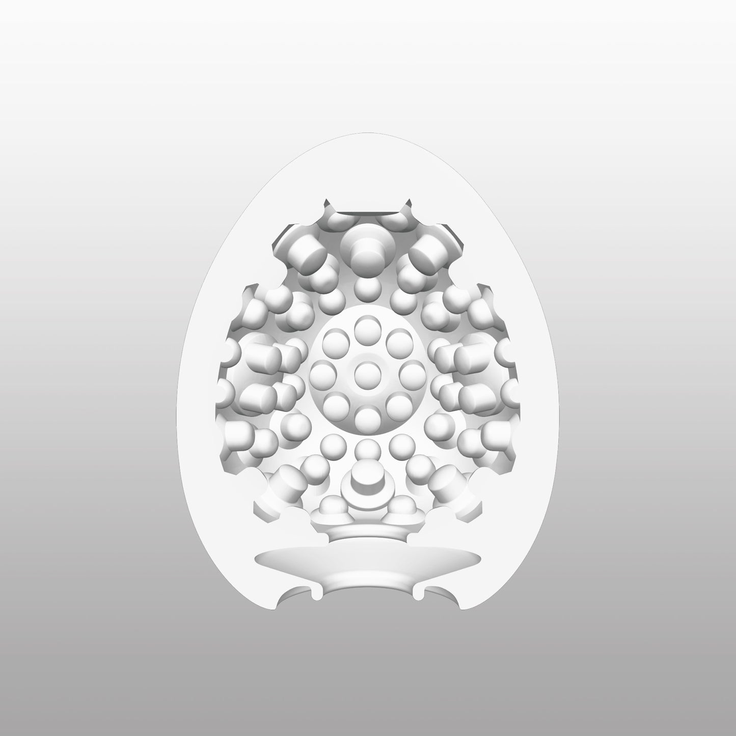 Doorsnede van de Tenga Egg Clicker met dicht geplaatste bolvormnokjes en cirkelvormige details