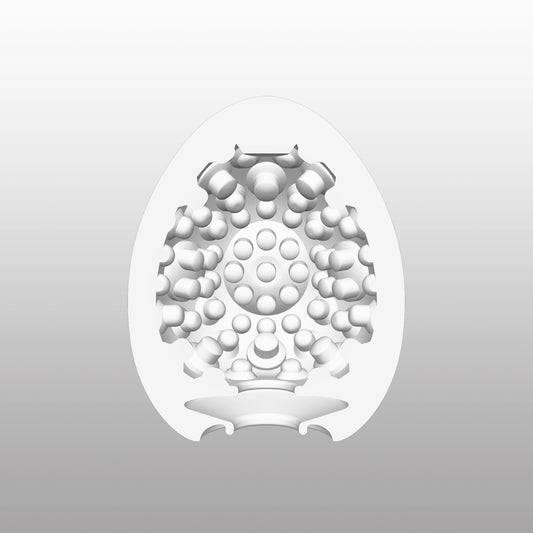 Doorsnede van de Tenga Egg Clicker met dicht geplaatste bolvormnokjes en cirkelvormige details