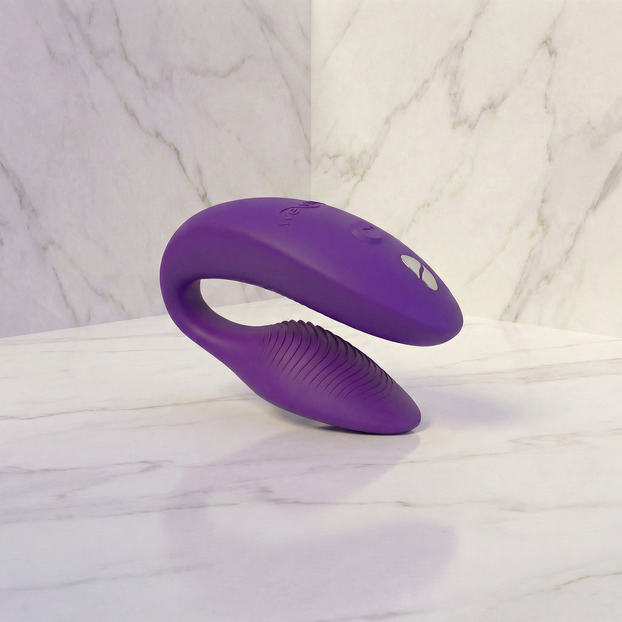 We-Vibe Sync 2 roze koppelvibrator vooraanzicht op witte achtergrond