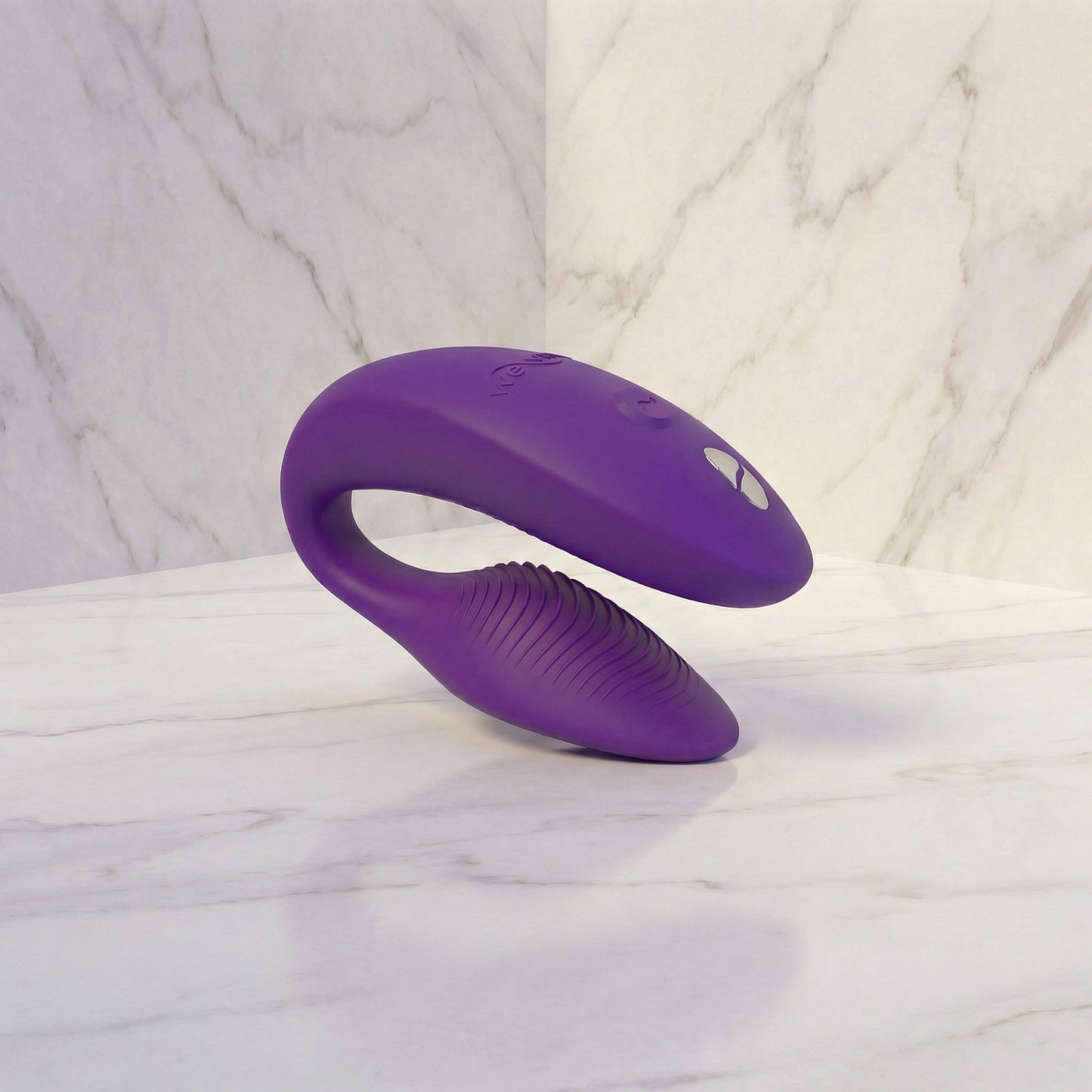 We-Vibe Sync 2 roze koppelvibrator vooraanzicht op witte achtergrond