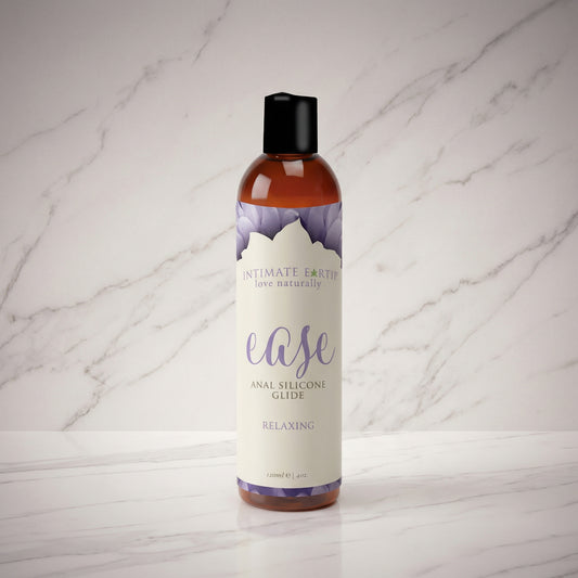 Intimate Earth Ease anaal siliconen glijmiddel 120ml fles met pompdispenser op witte achtergrond