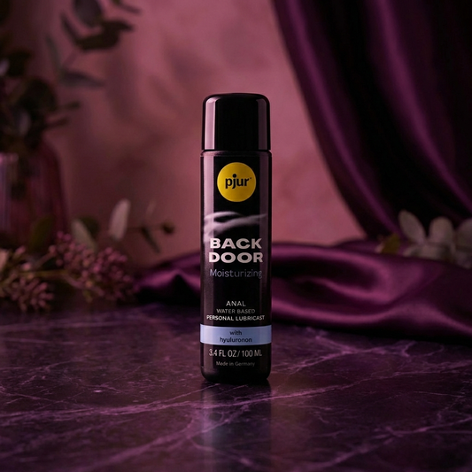 Pjur Backdoor Comfort Glide glijmiddel zijaanzicht met productinformatie en doseerflacon