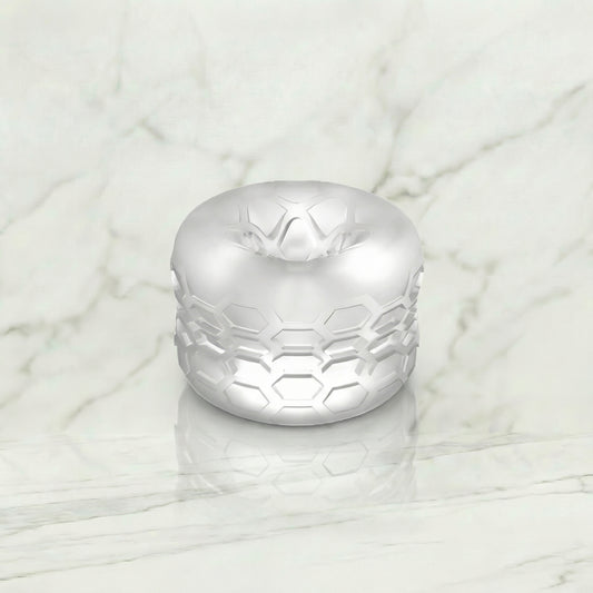 Sono masturbator met bumper van De Paarse Keizerin, vooraanzicht op witte achtergrond