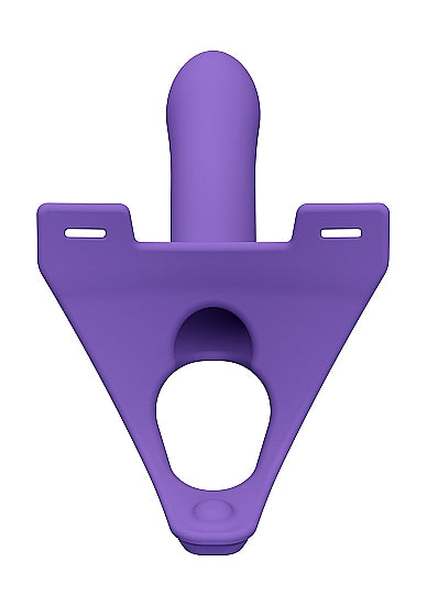 Bovenaanzicht van paarse siliconen strap-on met driehoekige basisplaat en opening