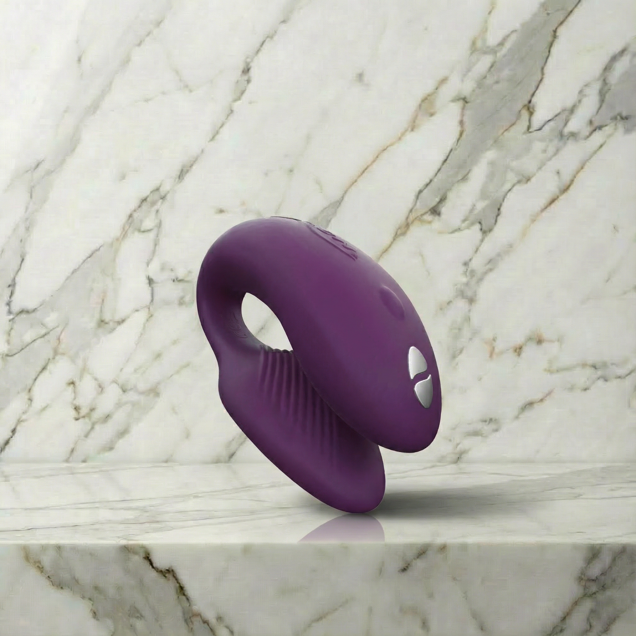 Close-up van bedieningsknoppen en premium siliconen materiaal van blauwe We-Vibe Chorus